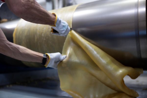 Rubber adhesive production